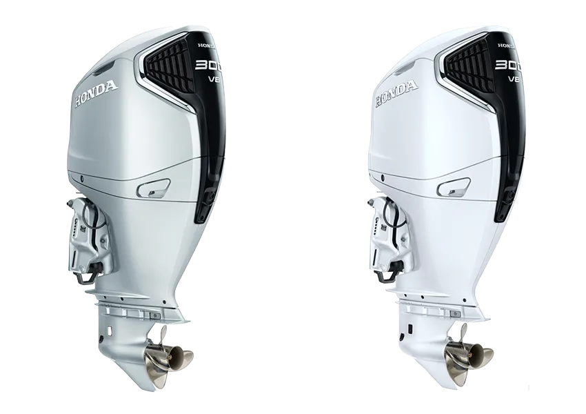 New BF300 outboard motor encased in Aquamarine Silver (left) or Grand Prix White (right)